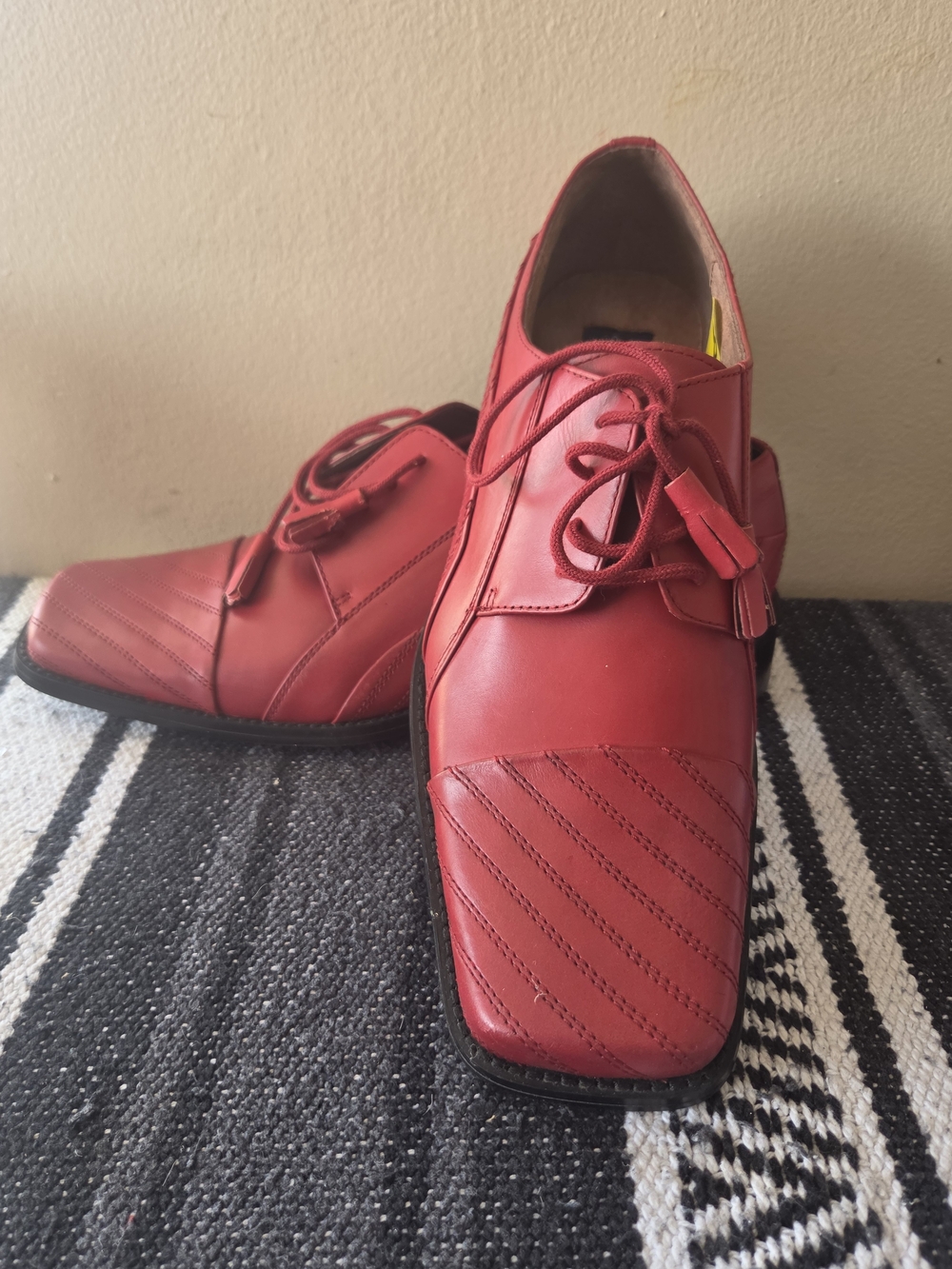 pair of red Giorgio Brutini men's dress shoes